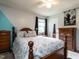 Bedroom with natural light, ceiling fan and decorative molding at 203 Lane Of Sir Kay, Garner, NC 27529