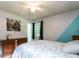 Bedroom with natural light, ceiling fan and decorative molding at 203 Lane Of Sir Kay, Garner, NC 27529