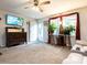 Bright and airy living room featuring a comfortable sofa, a large window, and ample space for relaxation at 203 Lane Of Sir Kay, Garner, NC 27529
