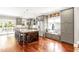 Spacious kitchen with stainless steel appliances, a large island, and ample cabinet space at 2218 Watersglen Dr, Apex, NC 27502