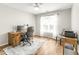 Home office space featuring a desk, chair, and natural light at 2218 Watersglen Dr, Apex, NC 27502