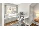 Bright home office with a window seat, desk, and natural light at 2218 Watersglen Dr, Apex, NC 27502