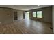 Spacious living area features wood-look floors and a bright, open layout at 2232 Tarboro Road Rd, Youngsville, NC 27596