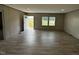 Open living space offers wood-look floors and great natural lighting at 2232 Tarboro Road Rd, Youngsville, NC 27596
