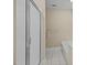 Bathroom with a glass enclosed shower and tiled floor with neutral-colored walls at 23 Caldwell, Pittsboro, NC 27312