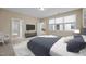 Inviting bedroom with soft carpet, abundant natural light, and a modern design at 23 Caldwell, Pittsboro, NC 27312