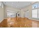 Bright, open floor plan connecting the living room and kitchen with parquet wood flooring at 23 Caldwell, Pittsboro, NC 27312