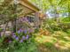 Beautiful home with lush landscaping and colorful blooms at 2400 Fairview Rd, Raleigh, NC 27608