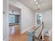 Hallway showcasing hardwood floors and doorways that lead to other rooms at 2400 Fairview Rd, Raleigh, NC 27608