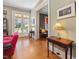Elegant living room with hardwood floors, classic decor, and large windows for natural light at 2400 Fairview Rd, Raleigh, NC 27608