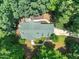Birds eye view of home with a green roof, mature trees, and winding walkway at 2401 Worthing Ct, Wake Forest, NC 27587