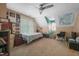 Spacious bedroom with neutral carpet, plenty of light, and ceiling fan at 2401 Worthing Ct, Wake Forest, NC 27587