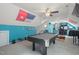 Spacious bonus room featuring a pool table and bright blue walls at 2401 Worthing Ct, Wake Forest, NC 27587