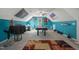 Large bonus room with a billiards table and decorative flags at 2401 Worthing Ct, Wake Forest, NC 27587