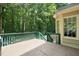 View from the outdoor deck with green rails looking towards the trees at 2401 Worthing Ct, Wake Forest, NC 27587