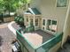 Birds eye view of deck featuring green rails and access to the backyard at 2401 Worthing Ct, Wake Forest, NC 27587