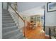 Inviting dining area with hardwood floors, staircase and natural light at 2401 Worthing Ct, Wake Forest, NC 27587