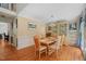 Dining room with hardwood floors, neutral colors, and decorative furnishings at 2401 Worthing Ct, Wake Forest, NC 27587
