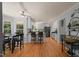 Bright kitchen featuring stainless appliances, granite countertops, and an adjacent breakfast area at 2401 Worthing Ct, Wake Forest, NC 27587