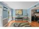 Piano room with hardwood floors, piano and stylish decor at 2401 Worthing Ct, Wake Forest, NC 27587