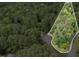 Picture of home located on private lot surrounded by beautiful trees and lush landscaping at 2612 Scarlet Sage Ct, Raleigh, NC 27613