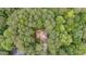 Expansive home featuring a private setting surrounded by lush, mature trees and landscaping at 2612 Scarlet Sage Ct, Raleigh, NC 27613