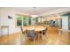 Open-concept dining area with a view of the kitchen and natural light at 2612 Scarlet Sage Ct, Raleigh, NC 27613