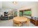 Cozy basement dining area with a round table and chairs with sliding doors leading to the outside at 2612 Scarlet Sage Ct, Raleigh, NC 27613