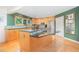 Modern kitchen with stainless steel appliances, granite countertops, and an island at 2612 Scarlet Sage Ct, Raleigh, NC 27613