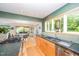 Bright kitchen featuring stainless steel appliances, eat-in kitchen, and view to the dining room at 2612 Scarlet Sage Ct, Raleigh, NC 27613