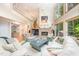 Spacious living room with high ceilings, a fireplace, and access to the outdoor deck at 2612 Scarlet Sage Ct, Raleigh, NC 27613