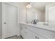 A spacious bathroom with double sinks, modern fixtures, and ample storage space at 2708 Chert Ln, Raleigh, NC 27610