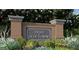 Elegant brick community sign for Trace at Olde Towne with vibrant landscaping at 2708 Chert Ln, Raleigh, NC 27610