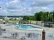 Community pool with lounge seating at 2708 Chert Ln, Raleigh, NC 27610