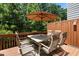 Cozy outdoor patio featuring a dining table set perfect for entertaining and enjoying the outdoors at 276 Linden Park Ln, Cary, NC 27519