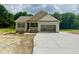 Charming single-story home with a two-car garage and covered porch, in a wooded area at 2760 Rains Mill Rd, Princeton, NC 27569