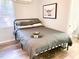 Cozy bedroom features a comfortable bed and tasteful decor at 2907 University Dr, Durham, NC 27707