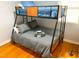 Comfortable bedroom featuring a sturdy bunk bed and ample lighting at 2907 University Dr, Durham, NC 27707