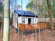 Charming guest house with a small deck, nestled among bamboo trees at 2907 University Dr, Durham, NC 27707