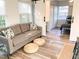 Comfortable living room with couch and decor, connecting to the bedroom and kitchen at 2907 University Dr, Durham, NC 27707