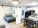 Modern open-concept living space flows from the kitchenette to the cozy bedroom at 2907 University Dr, Durham, NC 27707