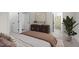 Bright bedroom with modern decor, neutral colors, and ensuite bathroom at 3053 Roy Ct, Apex, NC 27523