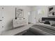 Bedroom with stylish decor, including a modern dresser and comfortable bed at 3053 Roy Ct, Apex, NC 27523