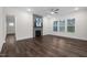 Living room with hardwood floors, fireplace and ample natural light at 3053 Roy Ct, Apex, NC 27523