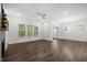 Spacious open-concept living room features hardwood floors and natural light at 3053 Roy Ct, Apex, NC 27523