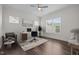 Stylish home office featuring a modern desk, comfortable chair, and ample natural light at 3053 Roy Ct, Apex, NC 27523