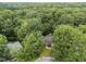 Aerial view of a home nestled among mature trees offering a sense of privacy and seclusion at 308 Trappers Sack Rd, Cary, NC 27513