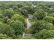 Aerial view of a property and its surrounding trees at 308 Trappers Sack Rd, Cary, NC 27513