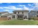 This home has a backyard with mature trees, a playground, and a patio perfect for outdoor relaxation at 3181 Zebroid Way, New Hill, NC 27562