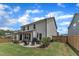 Enjoy a private backyard with patio and pergola on a beautifully maintained lawn at 3181 Zebroid Way, New Hill, NC 27562